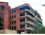 Фото 8 - изготовления фальшфасада для закрытия недостроенного здания.